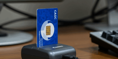 cac smart card being inserted into a usb card reader on a mi 20260331 100214